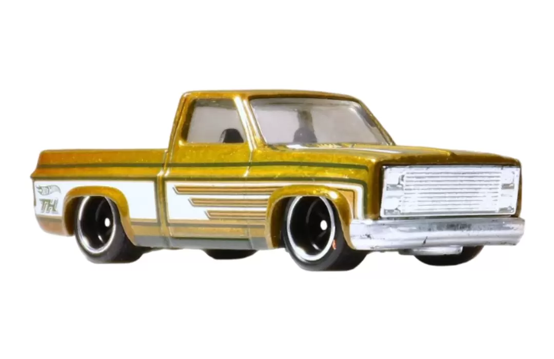 Foto da miniatura Hot Wheels 83 Chevy Silverado (STH) na cor Amarelo