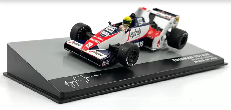 Foto da miniatura IXO Toleman TG183B Hart Ayrton Senna 1984 na cor Branco
