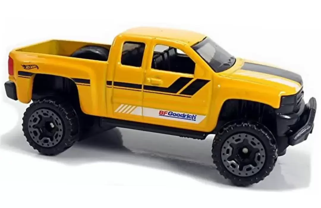 Foto da miniatura Hot Wheels Chevy Silverado Off-Road na cor Amarelo