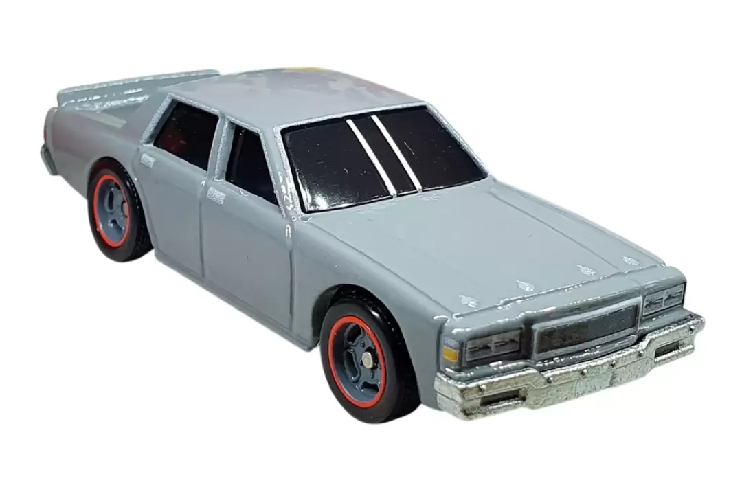 Foto da miniatura Hot Wheels 1987 Chevy Caprice na cor Cinza
