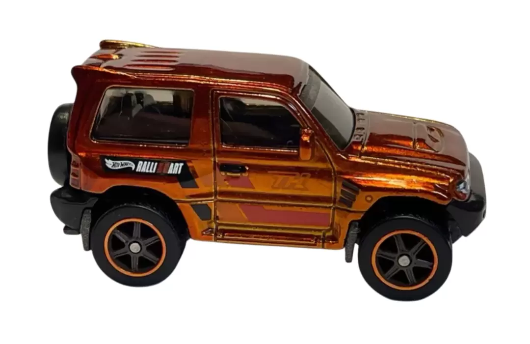 Foto da miniatura Hot Wheels Mitsubishi Pajero Evolution (STH) na cor Laranja