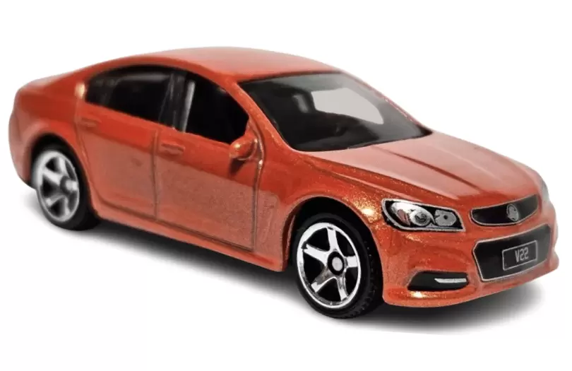 Foto da miniatura Matchbox Holden VF Commodore SSV na cor Laranja